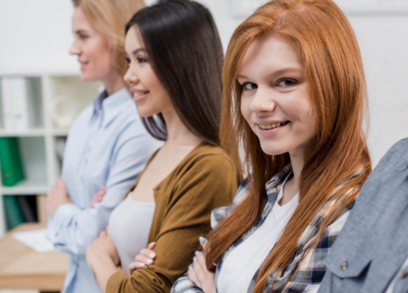 Financial planning materials organized on desk with calculator and documents